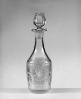 A cut-glass bitters decanter